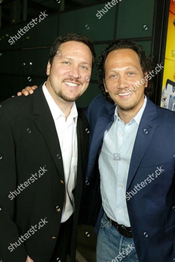 Are Rob Schneider and John Schneider brothers?