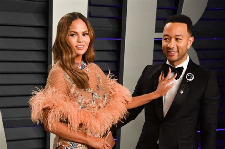 Chrissy Teigen Raves About Husband John Legend For Missing A Flight For Her!