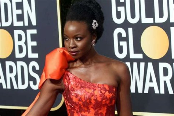 Danai Gurira Still Shines In Metallic-Red Rodarte Golden Globes Dress As ‘Black Panther’ Fans Praise Star For Same Sex Kiss