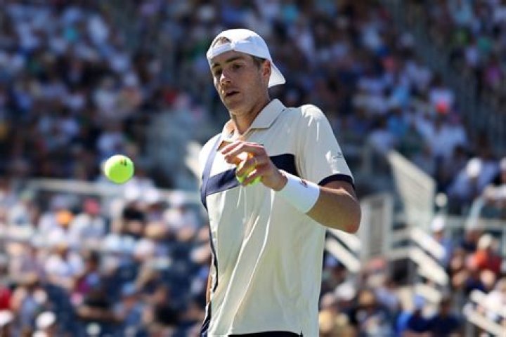 How many titles has John Isner won? What is John Isner rank?