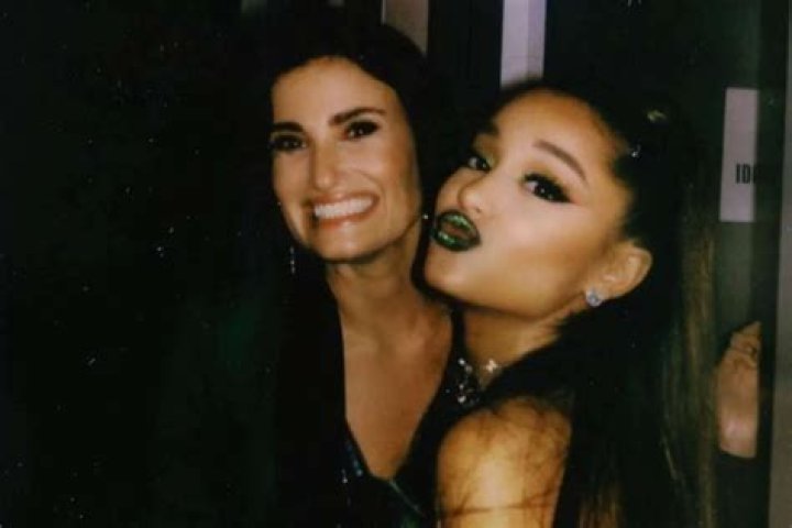 Idina Menzel Releases Yule Log Video For Her Christmas Duet With Ariana Grande A Hand For Mrs. Claus