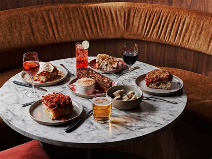 Javier Bardem burst out of a cake in drag on Daniel Craig’s birthday