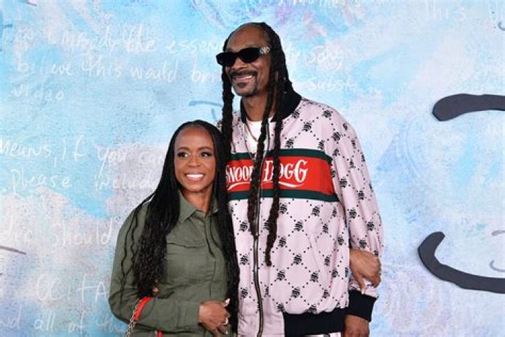 Kandi Burruss’ Latest Photo With Riley Burruss Next To A Graphic Representation Of Snoop Dogg Has Fans Saying She Should Collab With The Rapper