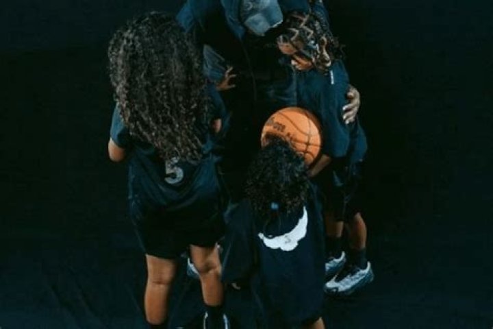 Kanye West Hugs His Kids Despite Dispute With Adidas