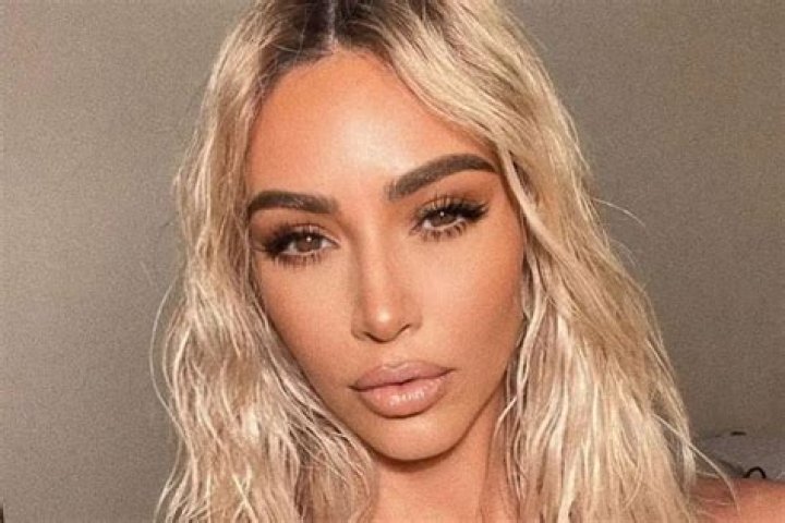Kim Kardashian Flaunts Her Curvy Beach Body In New Quarantine Workout Photos