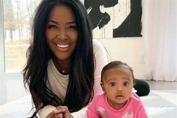 Kris Jenner, Watch Out! Kenya Moore Is Already Teaching Her Baby Girl, Brooklyn How To Be A Boss – The Miracle Baby Seems To Love It By The Way She’s Showing Off Her ‘Millionaire Smile’