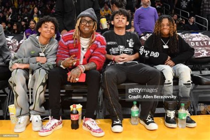 Lil Wayne Rings In The New Year With His Daughter, Reginae Carter, And His Three Sons — Dwayne III, Cameron, And Neal Carter In Viral Video