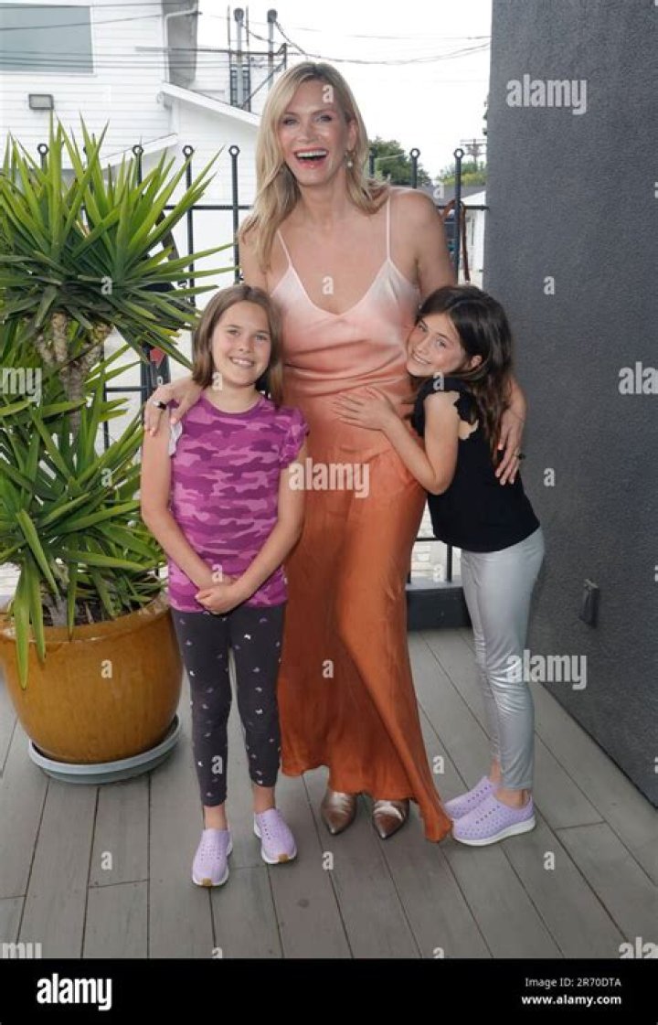 Natasha Henstridge family, husband, children, parents, siblings