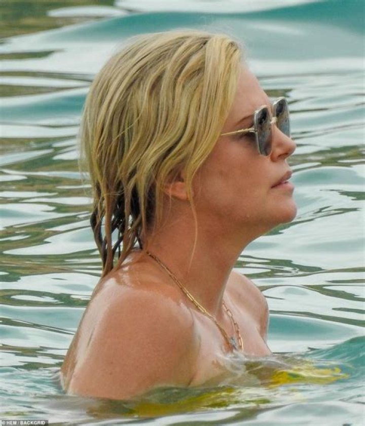 Charlize Theron in Bathing Suit Says 