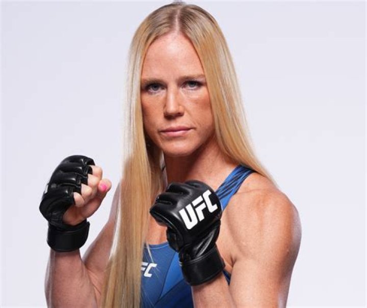 Holly Holm in Bathing Suit Says 