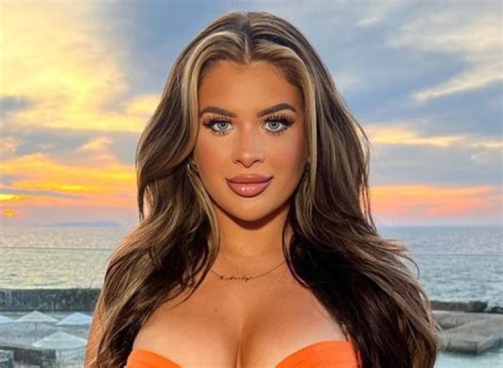 Liberty Poole in Bathing Suit Says 