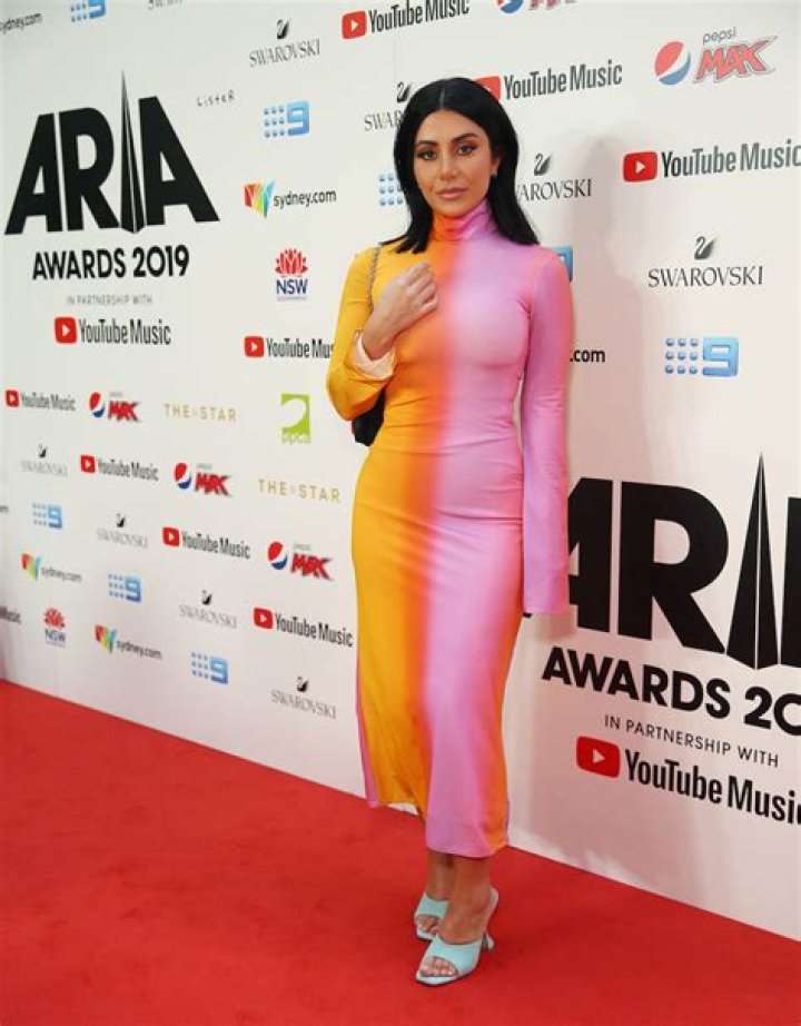 Martha Kalifatidis in Bathing Suit is 