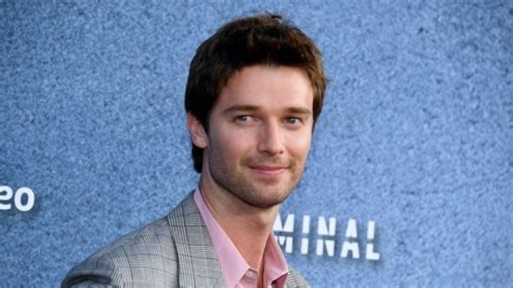 Patrick Schwarzenegger lets dad Arnold cut his hair — with comically large scissors