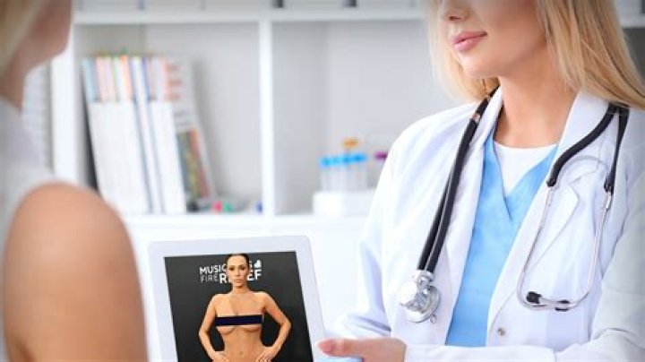 Plastic Surgeon Says Dat Booty if FAKE!