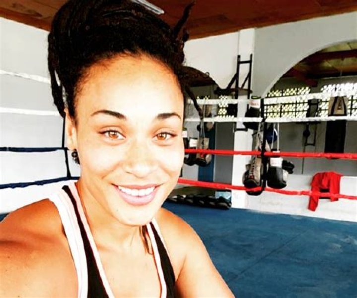 Pro Boxer Hanna Gabriels Shares Swimsuit Photo Cuddling Puppies