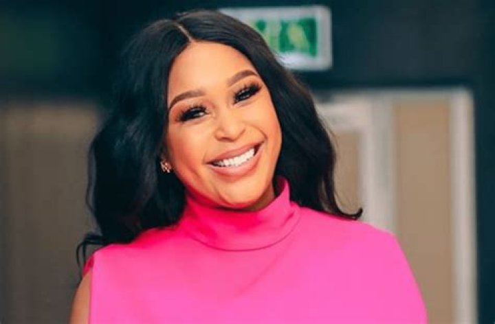 South African Model Minnie Dlamini Shares Swimsuit Photo By the Pool