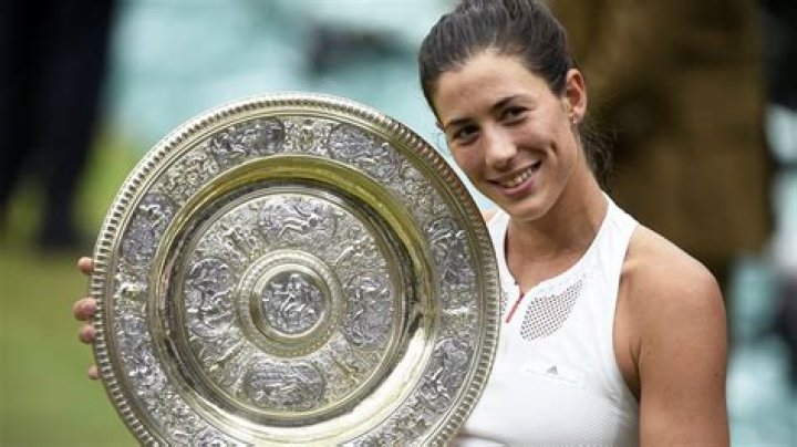 Who is Garbiñe Muguruza's father José Antonio Muguruza?